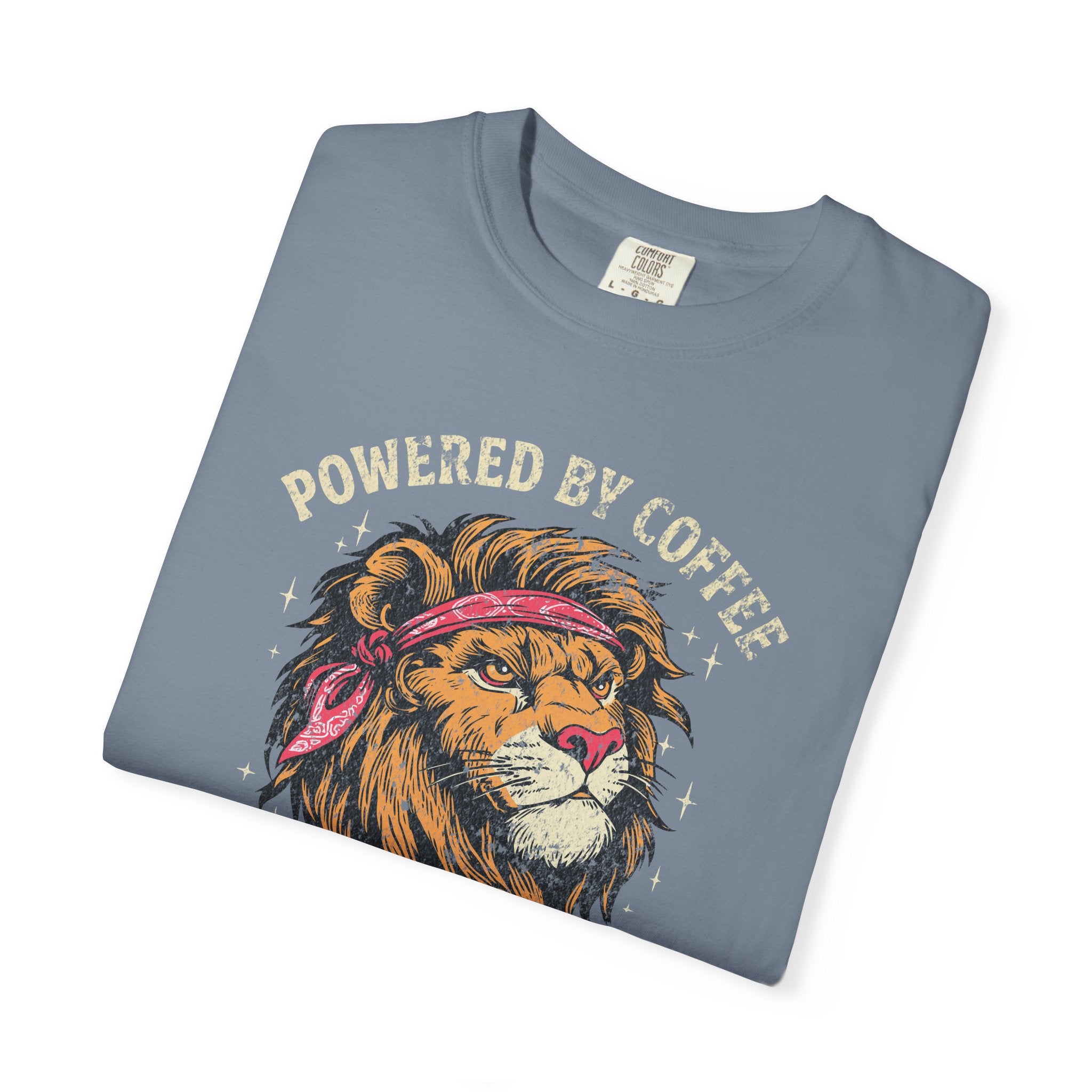 Blue t-shirt featuring a distressed graphic of a lion wearing a red bandana with coffee text.