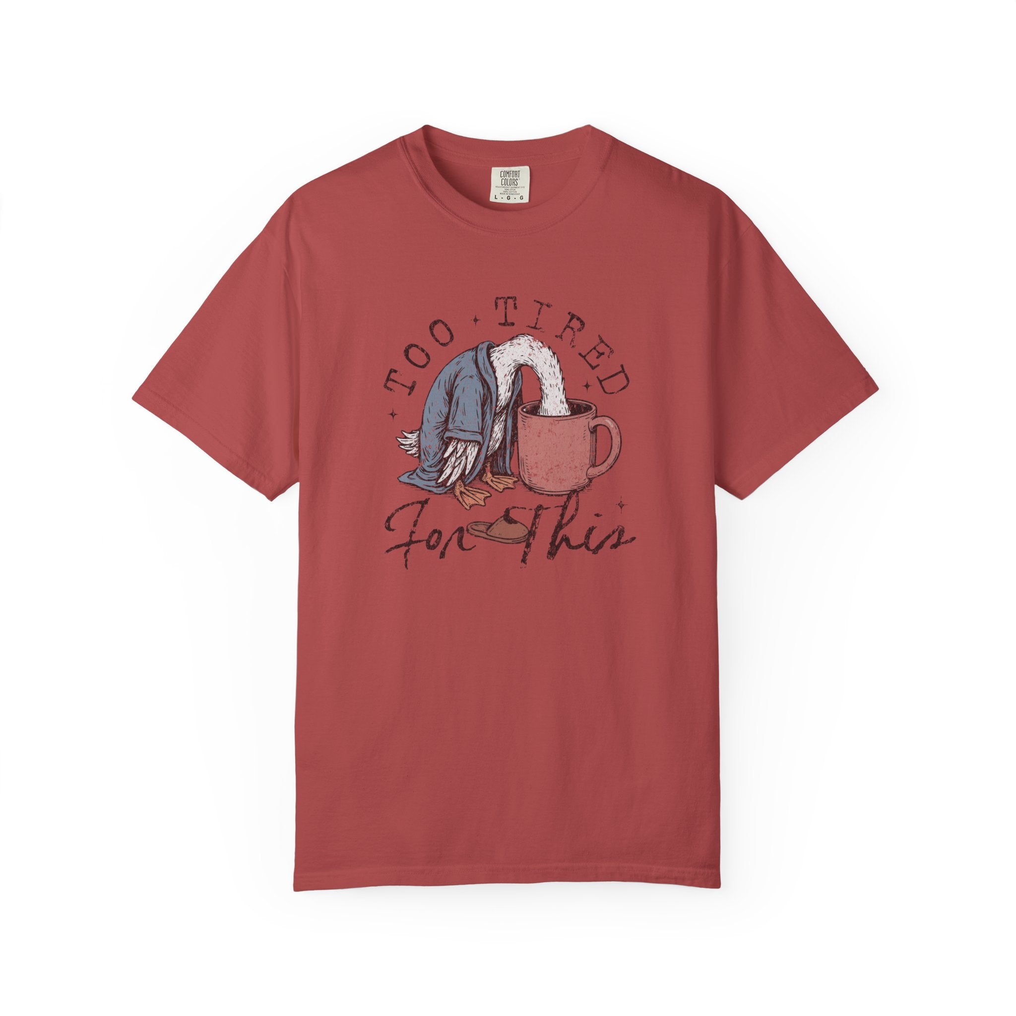 Red unisex t-shirt with a graphic of a duck with its head in a coffee mug and text Too Tired For This