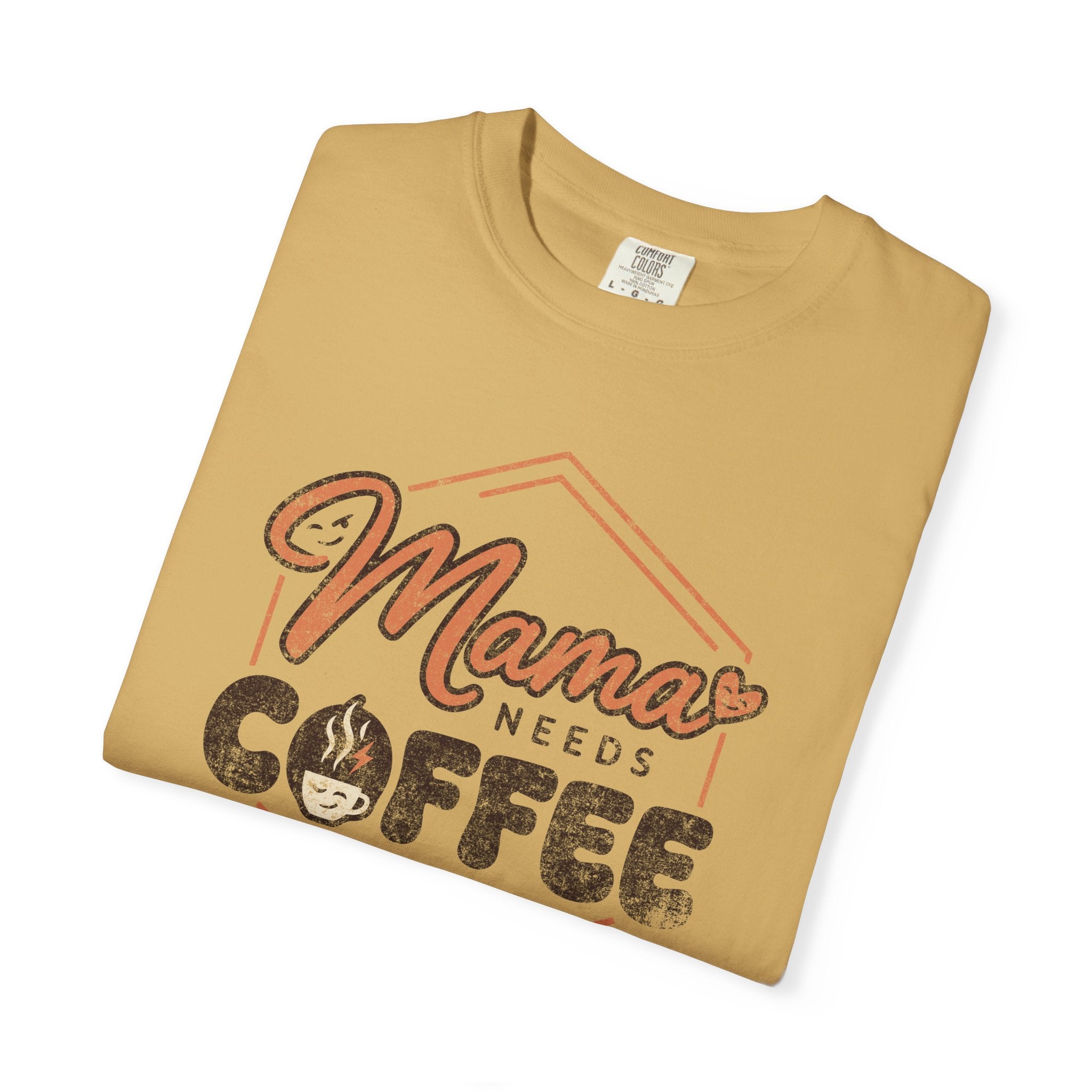 Folded mustard yellow unisex t-shirt with a distressed Mama Needs Coffee graphic print.