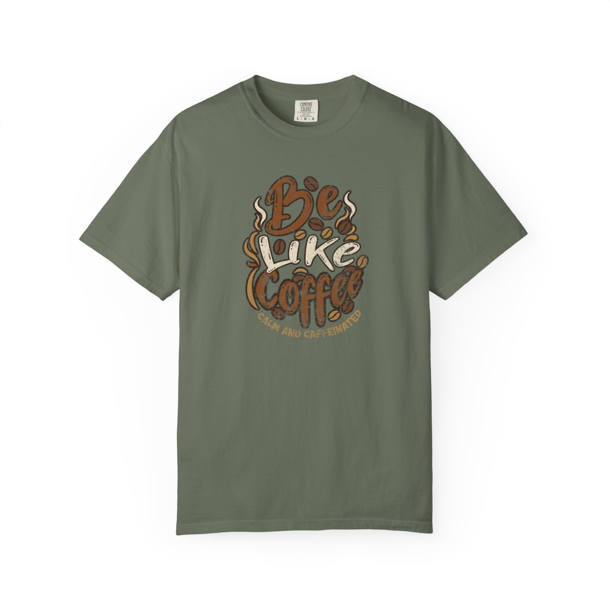 An olive green t-shirt featuring a retro distressed graphic that says Be Like Coffee.