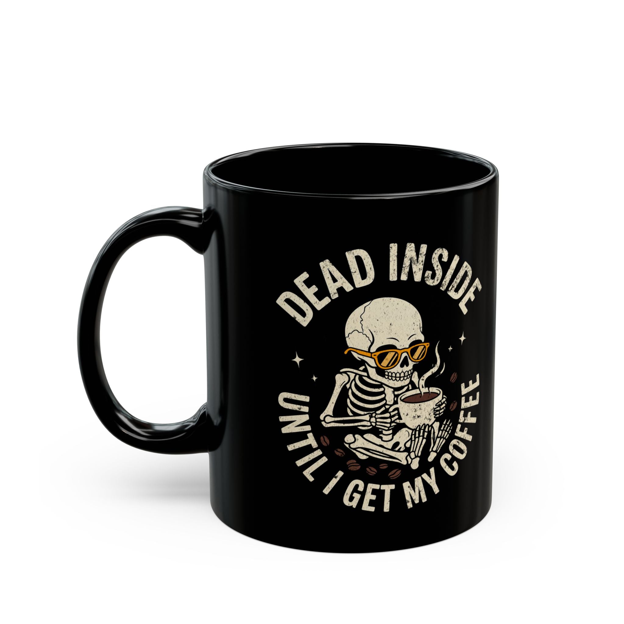Black ceramic mug featuring a skeleton wearing sunglasses and holding a cup of coffee.