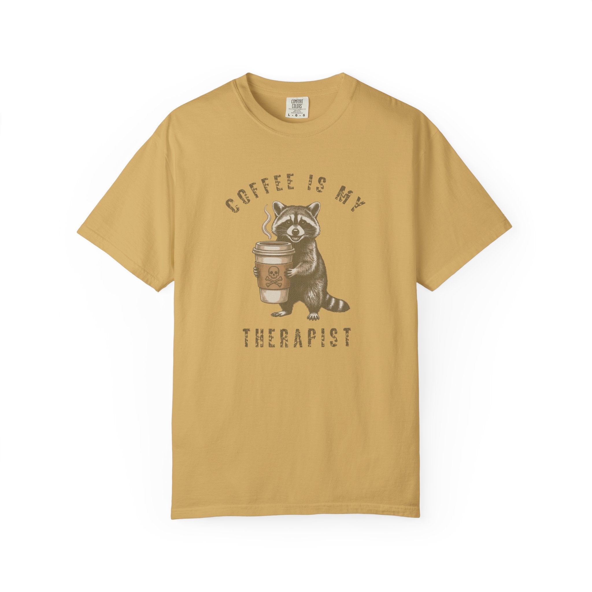Mustard yellow unisex cotton t-shirt featuring a raccoon holding a coffee cup with a skull logo.