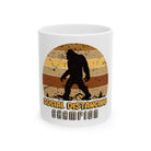 White coffee mug featuring a retro Bigfoot silhouette and the text Social Distancing Champion.