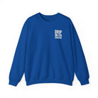 A royal blue crewneck sweatshirt featuring the white text Drip With Sarcasm on the chest.