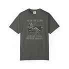 Dark grey Comfort Colors 1717 t-shirt with a vintage coffee bean graphic on a sofa.