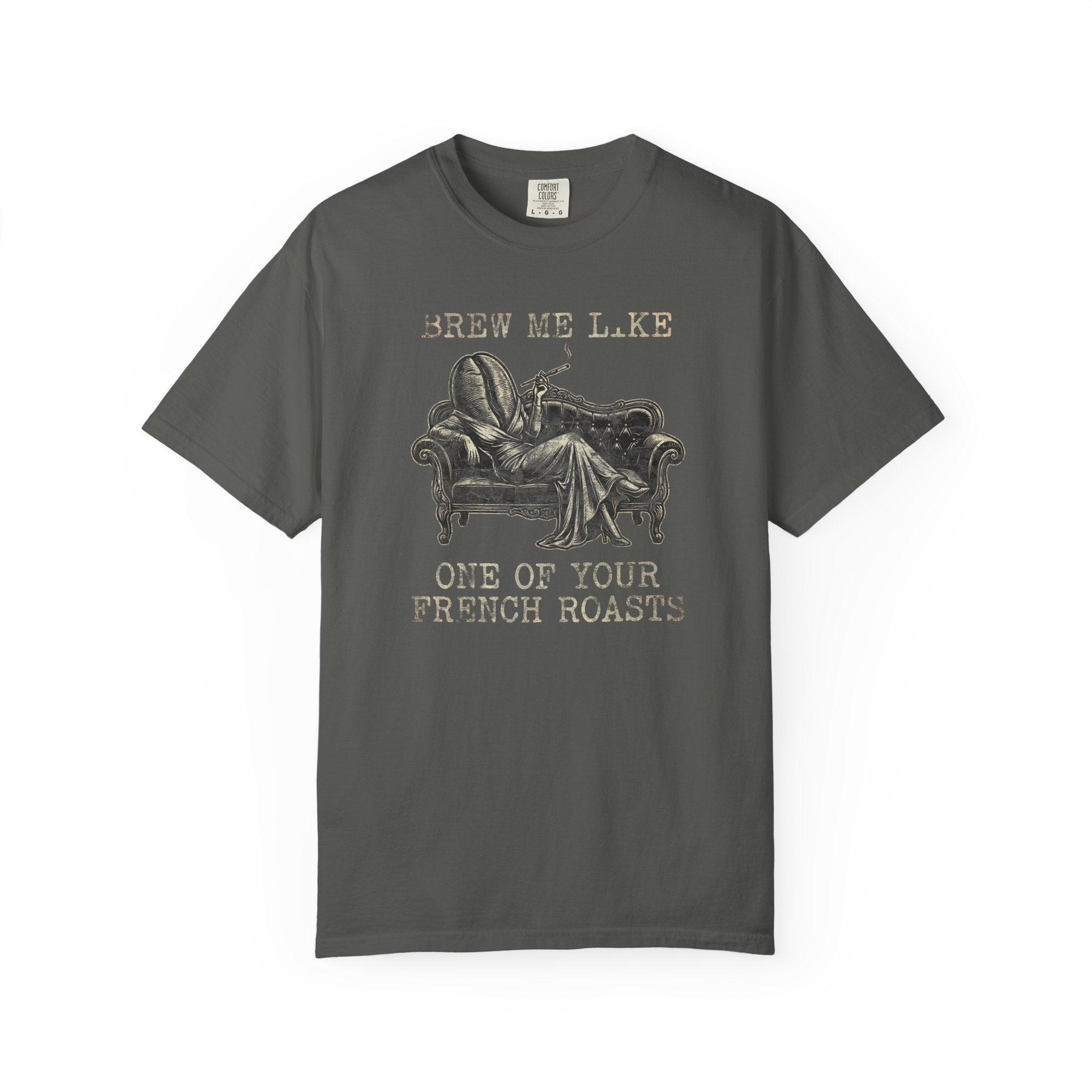 Dark grey Comfort Colors 1717 t-shirt with a vintage coffee bean graphic on a sofa.