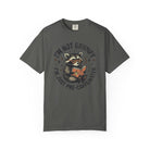 Dark grey t-shirt featuring a raccoon wearing glasses and reading a book with coffee text.
