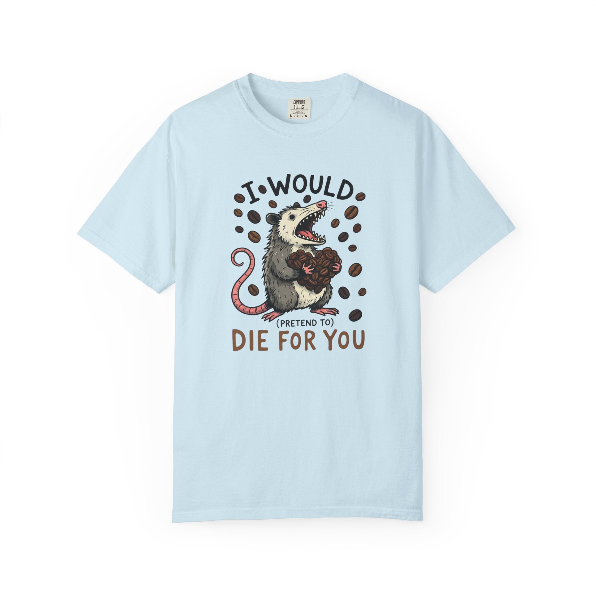 A light blue cotton t-shirt featuring a graphic of an opossum holding a heart made of coffee beans.