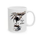 A white mug with a skeleton hand pouring coffee and the text "I Could Be Meaner".