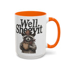 White ceramic mug with an orange handle and rim, featuring a raccoon in a cowboy hat holding a mug.