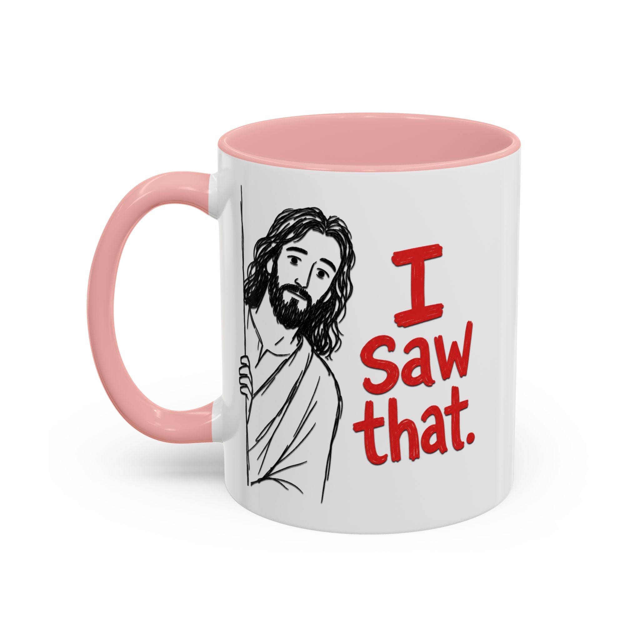 White ceramic mug with a pink handle and interior, featuring a drawing of Jesus saying I Saw that.