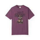 Purple t-shirt featuring a graphic of a raccoon wearing a cowboy hat and holding a coffee mug.
