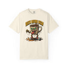 Cream-colored t-shirt with a graphic of a zombie coffee mug character and Death Before Decaf text.