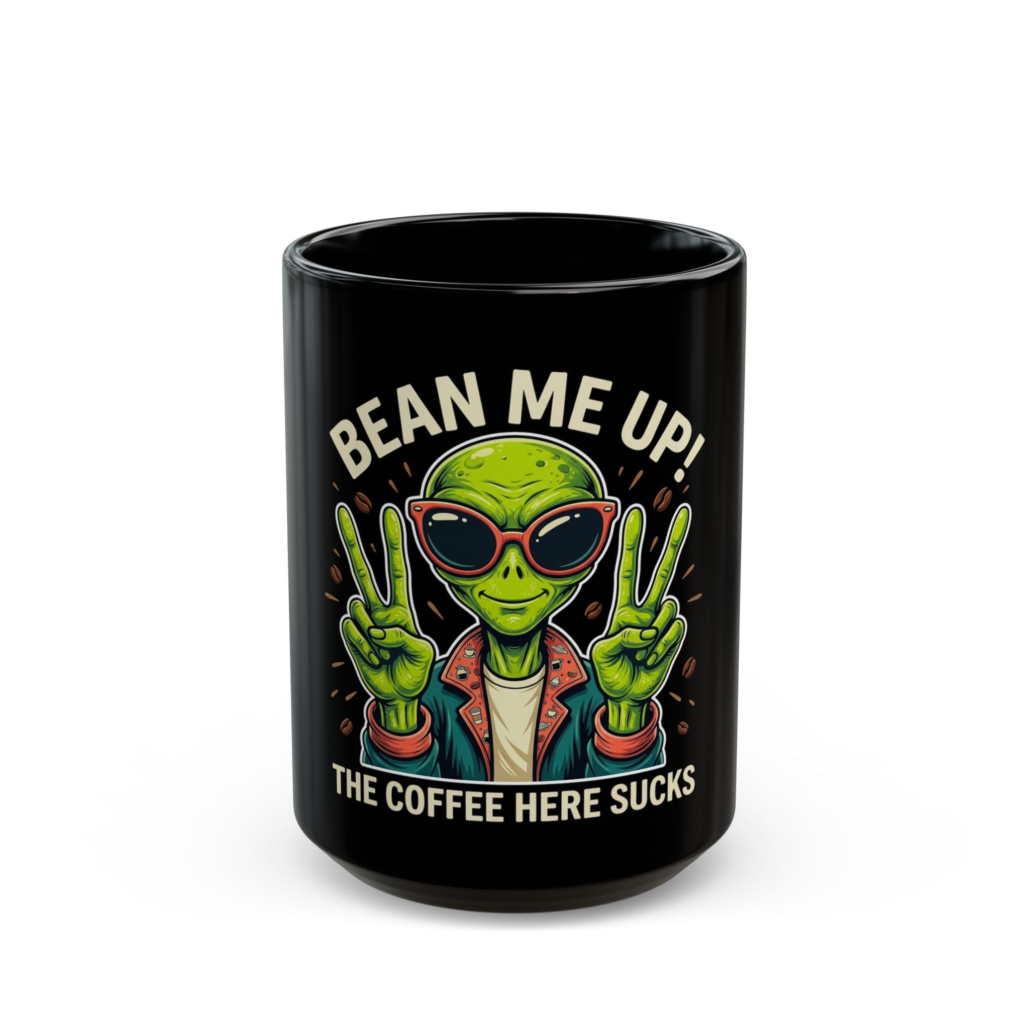 Black ceramic mug featuring a green alien wearing sunglasses and making peace signs.