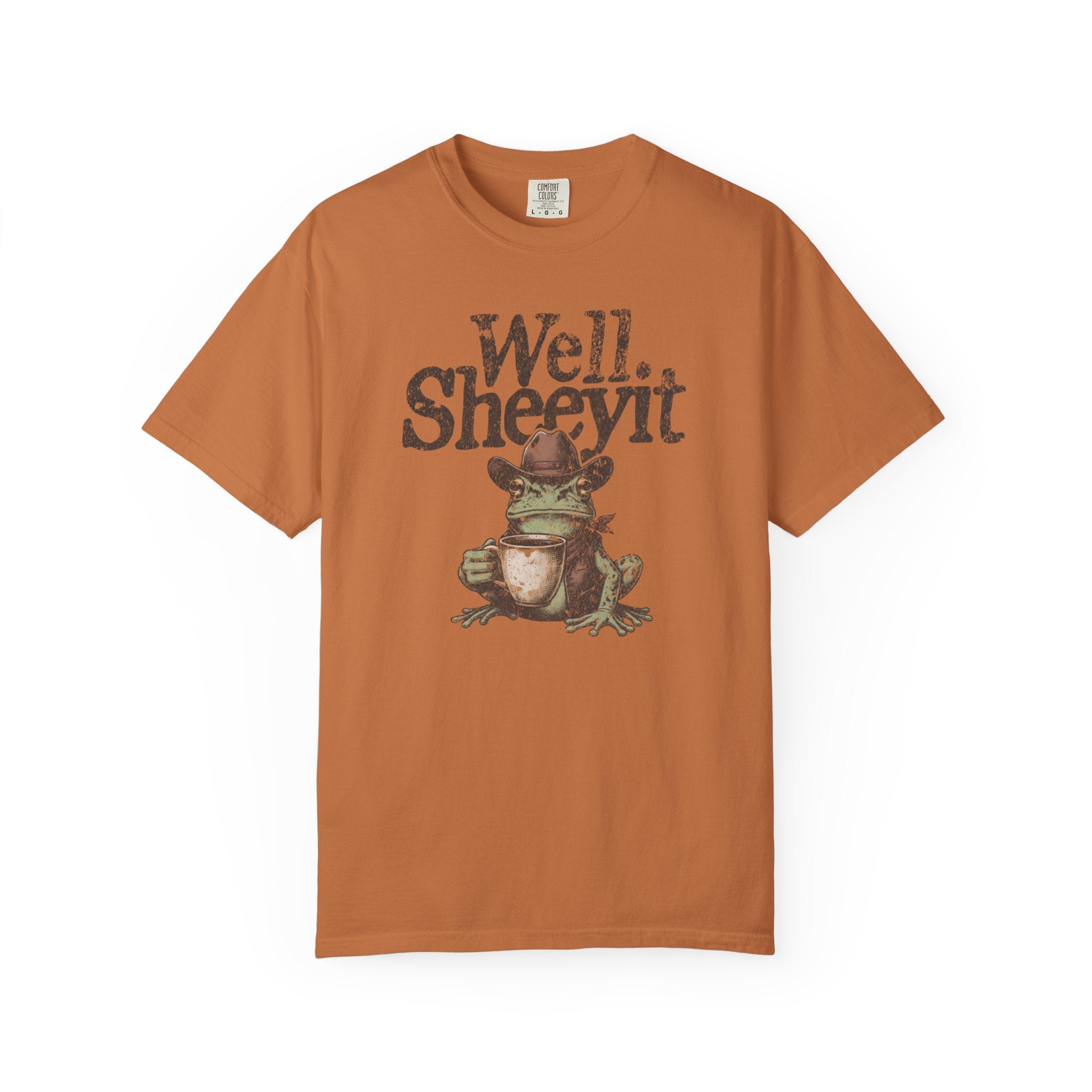 Rust-colored unisex cotton t-shirt featuring a graphic of a cowboy frog holding a coffee mug.