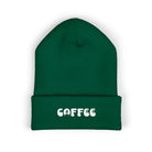 Green cuffed knit beanie with embroidered "COFFEE" text.