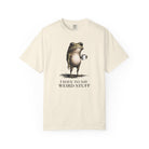 A cream-colored cotton t-shirt featuring a graphic of a frog holding a coffee mug with text below.