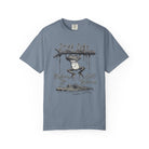 Blue unisex t-shirt with a graphic of a frog hanging from a branch above an alligator.