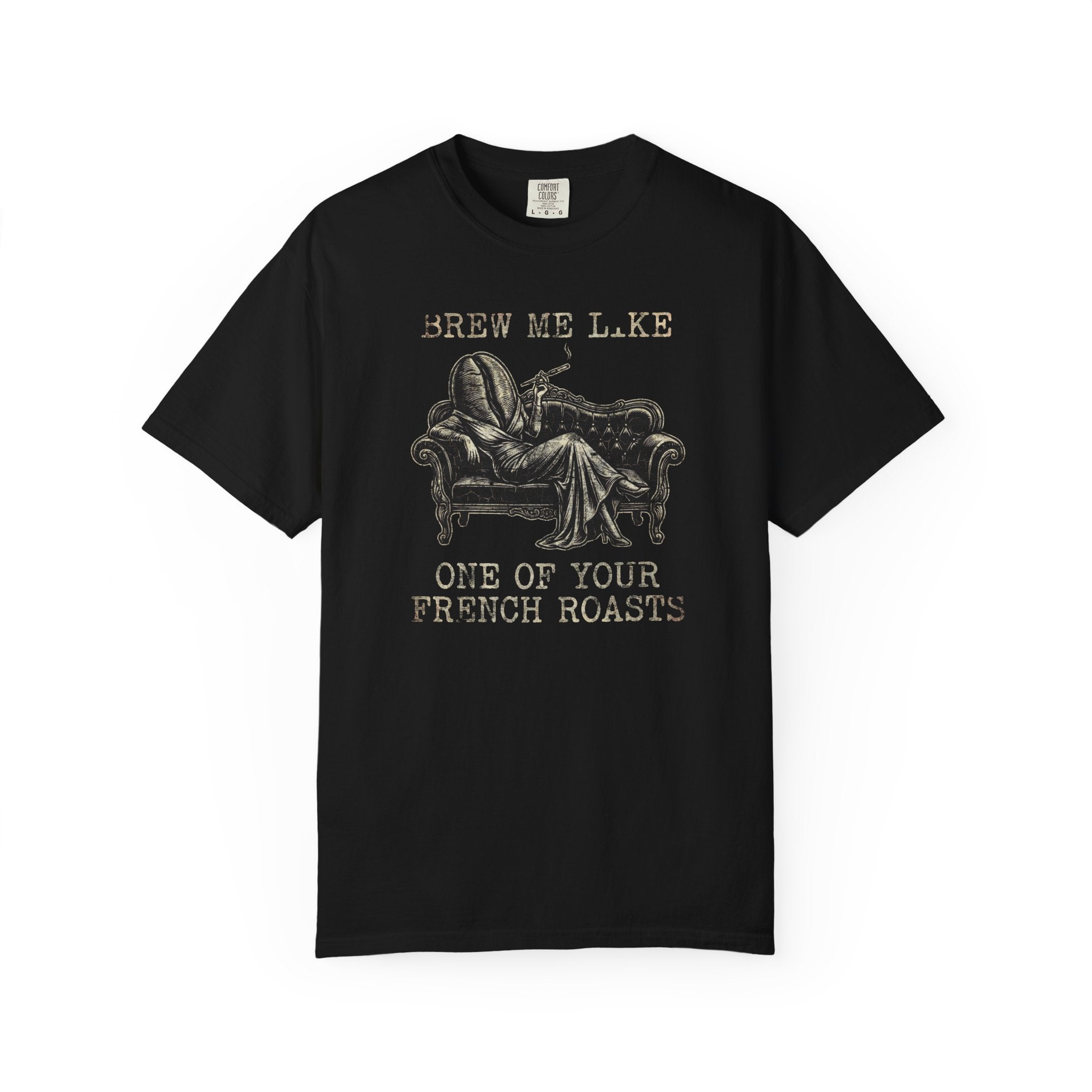 Black Comfort Colors 1717 t-shirt featuring a vintage graphic of a coffee bean lounging on a sofa.