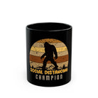 Black coffee mug featuring a retro Bigfoot graphic and the text Social Distancing Champion.