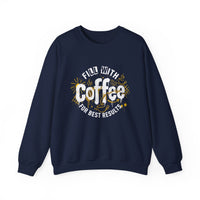 A navy blue crewneck sweatshirt featuring a white and gold coffee-themed graphic on the chest.