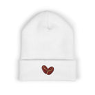 White cuffed knit beanie with embroidered coffee beans on the cuff.