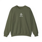 An olive green crewneck sweatshirt featuring a small white graphic of a smiling coffee cup.