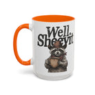 White ceramic mug with an orange handle and rim, featuring a raccoon in a cowboy hat holding a mug.