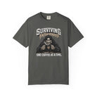 Charcoal grey Comfort Colors unisex t-shirt with a skeleton graphic drinking coffee.
