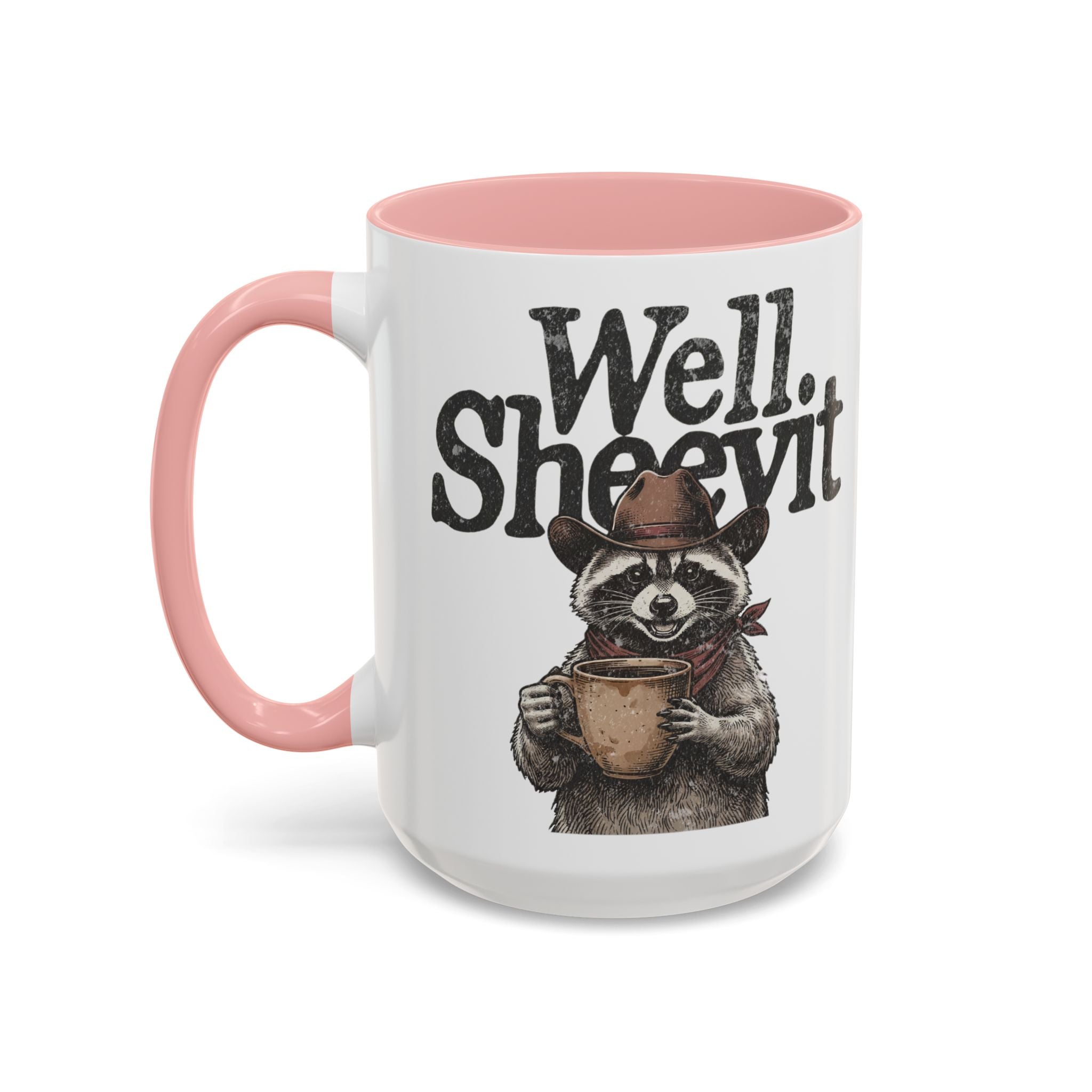 A white ceramic mug with a pink handle and rim, featuring a raccoon in a cowboy hat holding a mug.