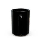 A black ceramic coffee mug featuring a Grim Reaper sewing graphic, shown from the handle side.