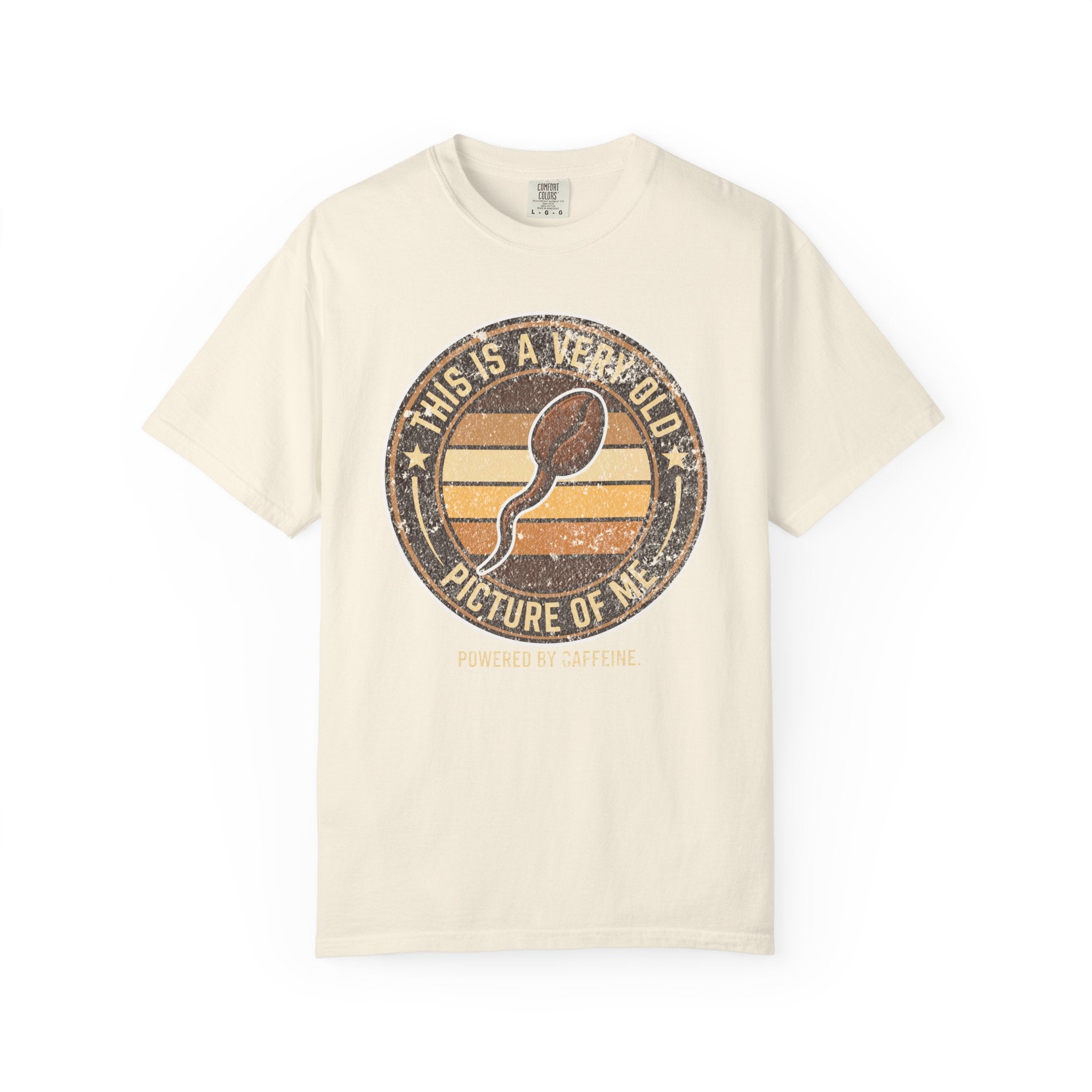Cream-colored t-shirt with a vintage-style graphic of a coffee bean shaped like a sperm cell.