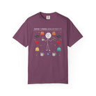 A purple unisex t-shirt featuring a distressed graphic of a stick figure with coffee and games.