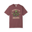 Maroon t-shirt featuring a green alien wearing sunglasses and making peace signs with coffee mugs.