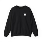 A black crewneck sweatshirt featuring a small white steaming coffee cup icon on the left chest.