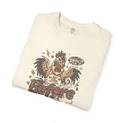Cream-colored unisex t-shirt featuring a distressed graphic of a rooster saying COFFEE.