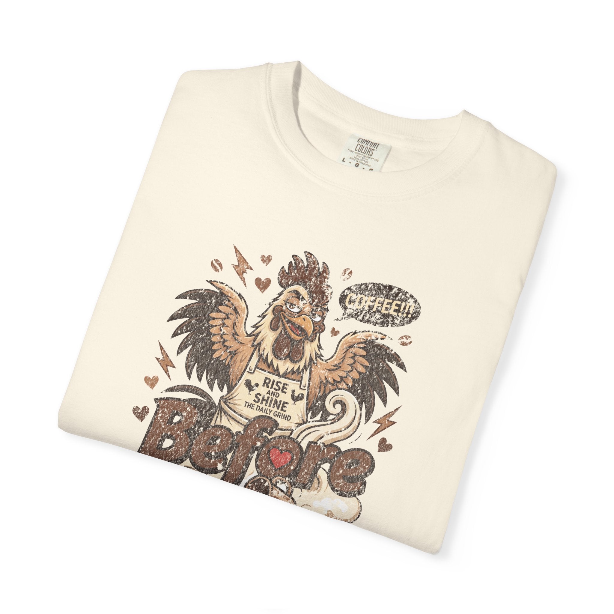 Cream-colored unisex t-shirt featuring a distressed graphic of a rooster saying COFFEE.