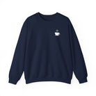 A navy blue crewneck sweatshirt featuring a small white steaming coffee cup icon on the chest.