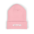 Pink cuffed beanie with embroidered "COFFEE" text.