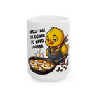 White coffee mug featuring a tired chick in an apron with the text Brew-tal! I'm going to need coffee