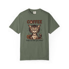 Olive green unisex t-shirt featuring a cute kitten holding a coffee mug with coffee-themed text.