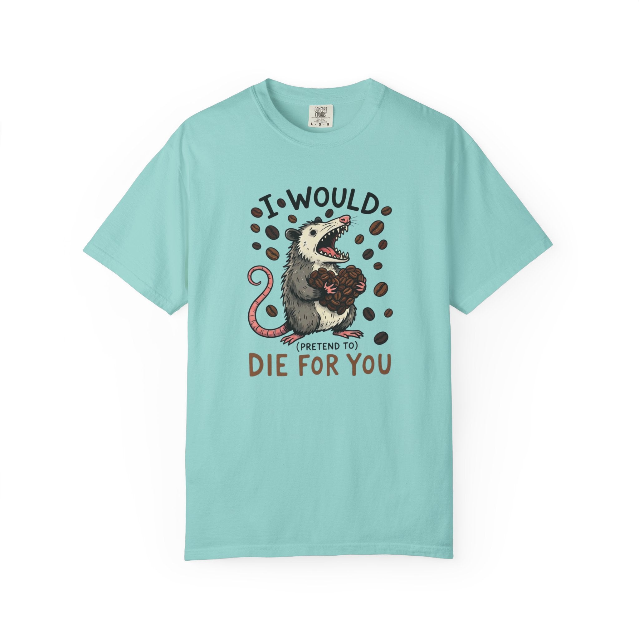 A light blue cotton t-shirt featuring a graphic of an opossum holding a heart made of coffee beans.