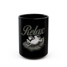 Black ceramic coffee mug featuring a graphic of a frog wearing sunglasses and holding a coffee cup.
