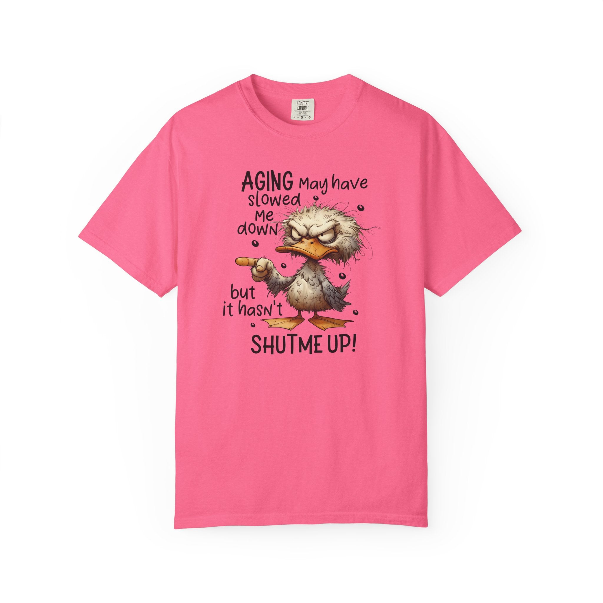 A pink heavyweight cotton t-shirt featuring a grumpy duck illustration and humorous text.