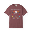 Maroon t-shirt with a distressed graphic of a stick figure, gaming icons, and coffee mugs.