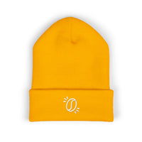 A bright yellow cuffed knit beanie featuring a small white embroidered coffee bean icon.