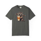 Charcoal grey Comfort Colors unisex t-shirt featuring a graphic of a raccoon holding a coffee cup.