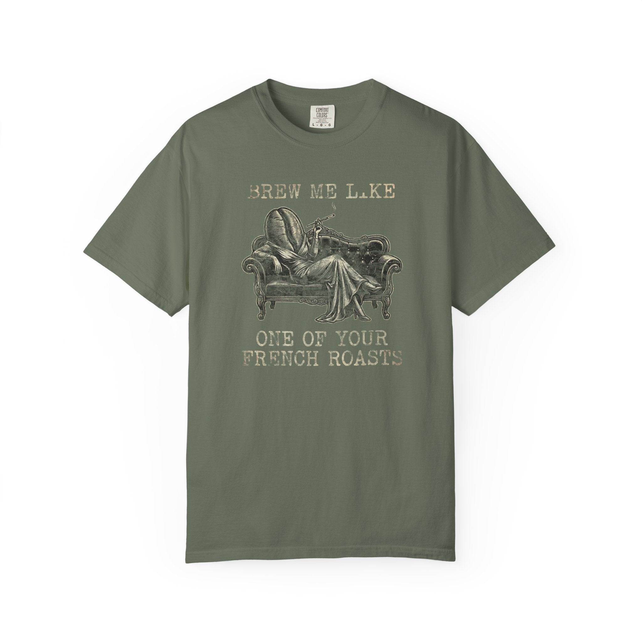 Olive green Comfort Colors 1717 t-shirt with a vintage graphic of a coffee bean lounging on a sofa.