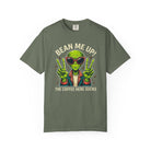 Olive green t-shirt featuring a graphic of an alien wearing sunglasses and making peace signs.