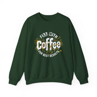 A dark green crewneck sweatshirt featuring a white and gold graphic that says Fill With Coffee.